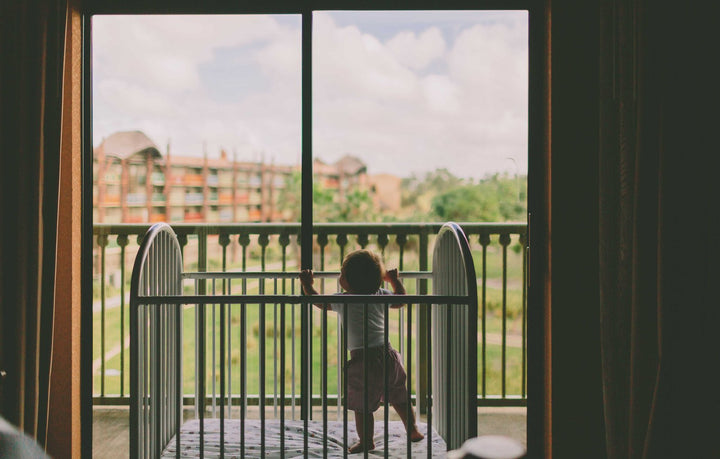 Safe sleeping baby in crib to prevent SIDS