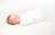 Safely Swaddled Baby In Crib